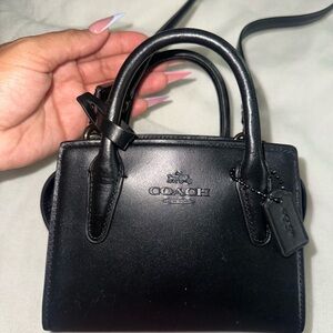 Coach Black Mini Leather Bag with Structured Design
